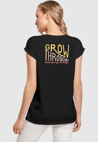 Merchcode T-Shirt  'Spring - Grow Through' in Schwarz