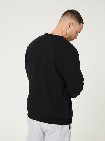 DAN FOX APPAREL Демисезонная куртка 'Christopher' в Черный