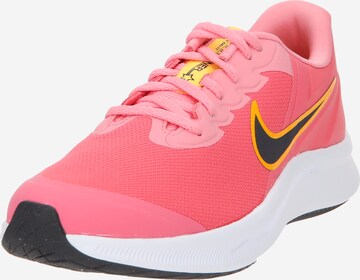 Chaussure de sport NIKE en orange : devant