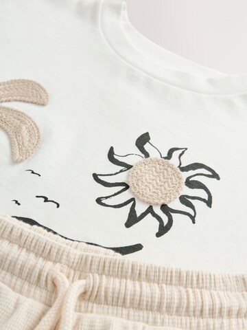 Set Next en beige
