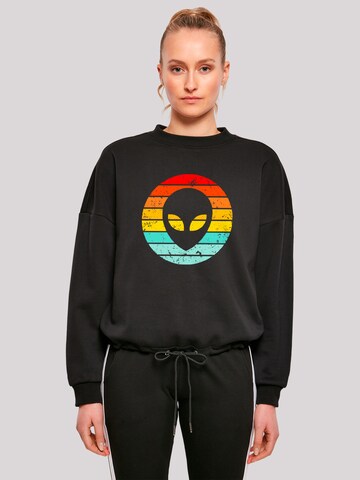 Sweat-shirt 'Alien Retro Sonnenuntergang' F4NT4STIC en noir : devant