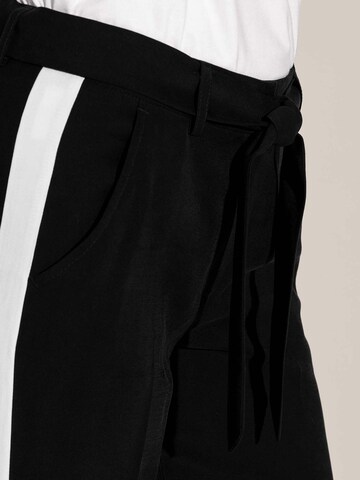 MADELEINE Loosefit Bügelfaltenhose in Schwarz