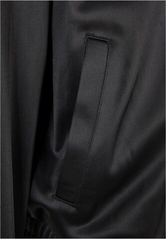 Geacă de primăvară-toamnă de la Urban Classics pe negru