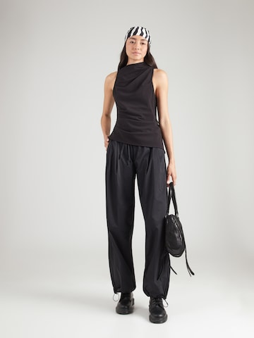WEEKDAY - Blusa 'Fauna' en negro