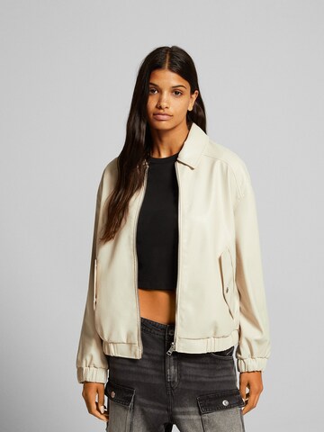 Bershka Between-season jacket in Beige: front