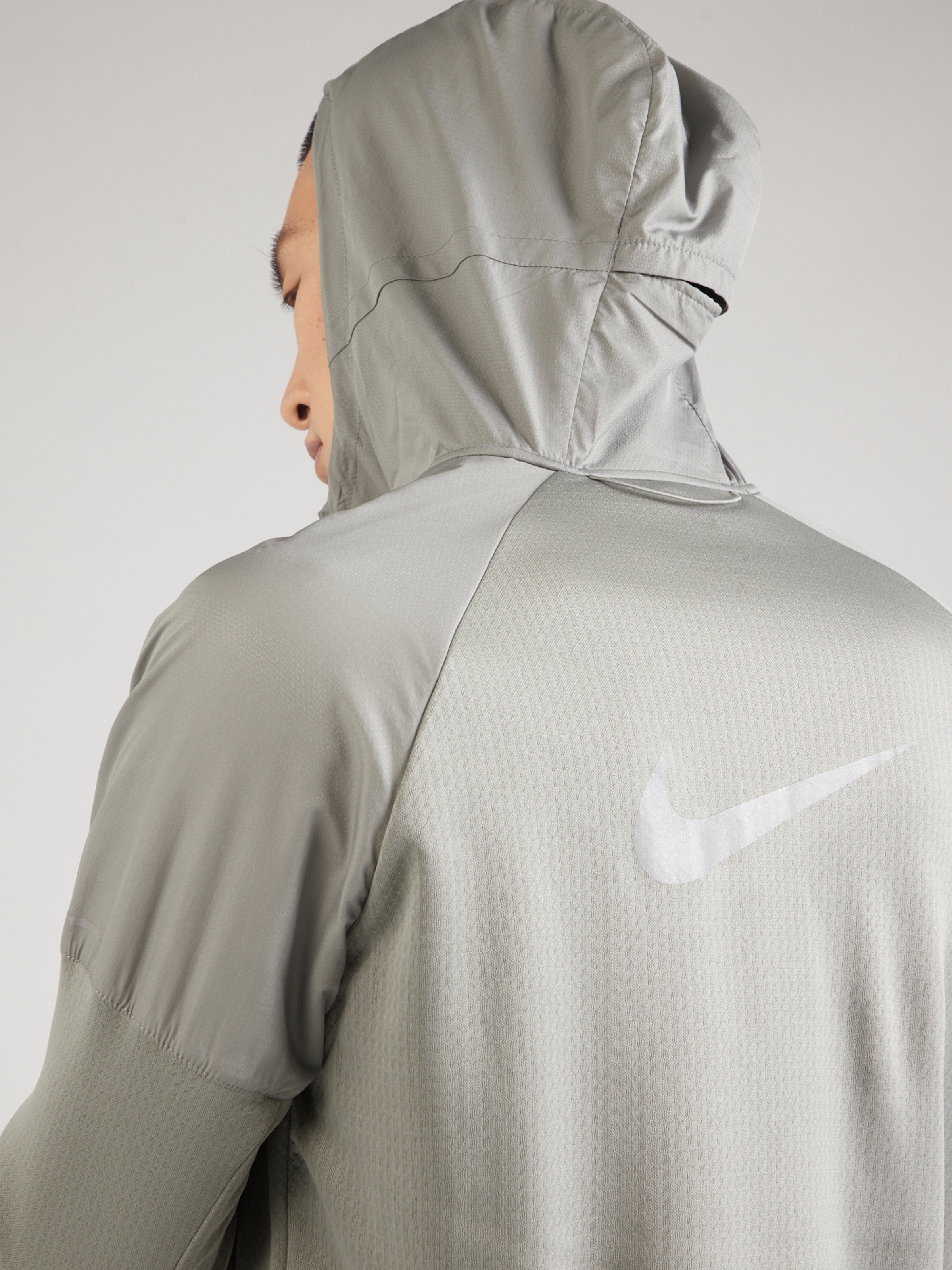 NIKE Sports jacket Sphere Miler in Grey Greige ABOUT YOU