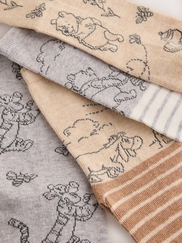 Next Sukat värissä beige