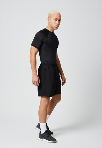 Maglia funzionale di SNOCKS in nero