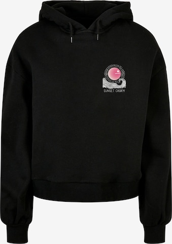 Sweat-shirt 'Sunset Charm' Merchcode en noir : devant