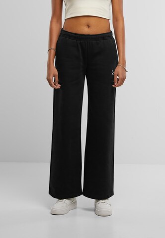 Karl Kani Wide leg Pants in Black: front