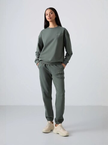 Tuta da jogging di Tommy Life in verde