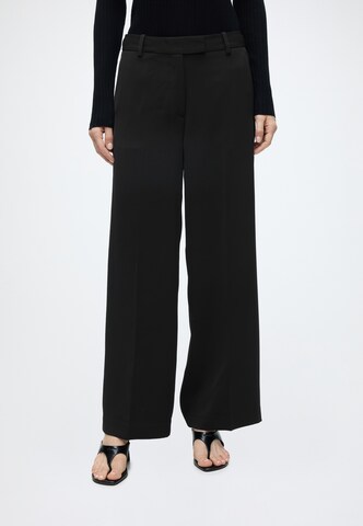 Wide leg Pantaloni cu dungă de la Calvin Klein Jeans pe negru: față