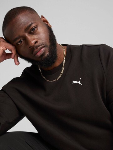 PUMA Shirt 'Puma Ess Crew Tr'‌‌‌‌‌‌‌‌ in Schwarz