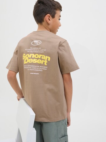 Jack & Jones Junior Футболка 'JCO Retreat Typographic' в Бежевый: спереди