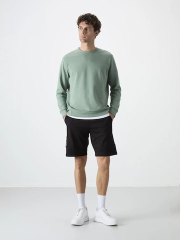 Regular Pantalon Tommy Life en noir