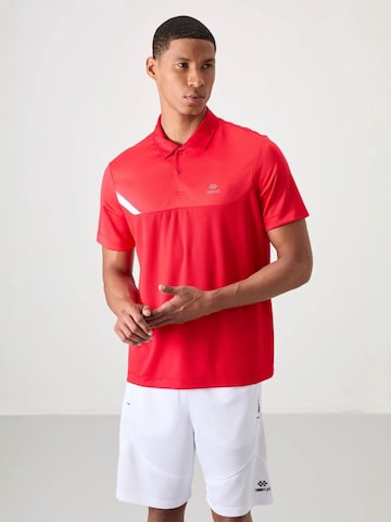 T-Shirt fonctionnel Tommy Life en rouge : devant
