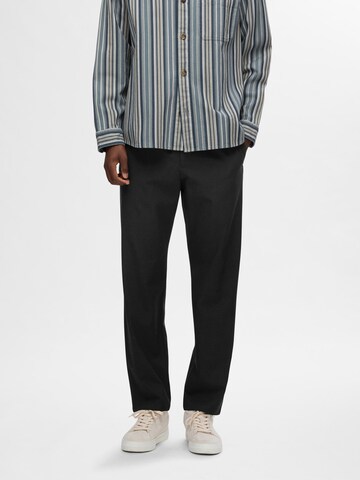 Regular Pantalon 'SLHROBERT' SELECTED en noir : devant