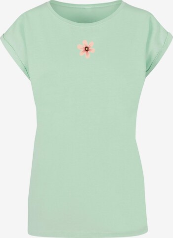 Merchcode Shirt 'Spring - Grow through 1' in Groen: voorkant