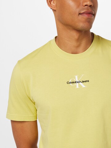 calvin klein jeans yellow shirt