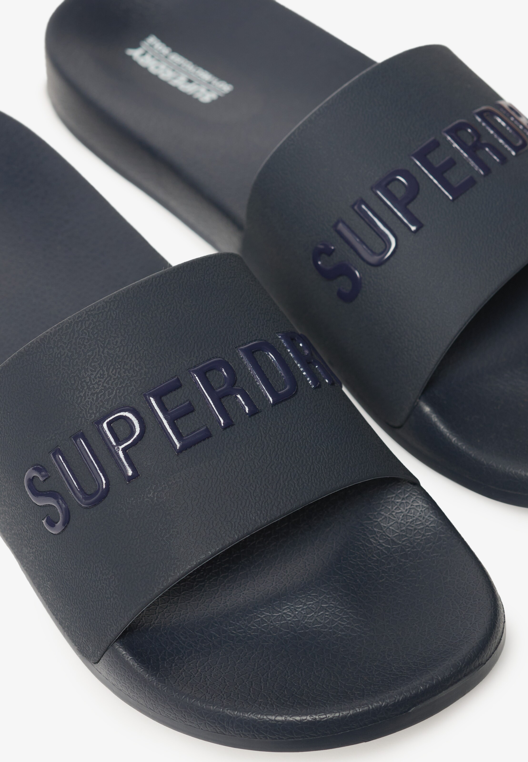 Claquettes / Tongs Superdry en bleu