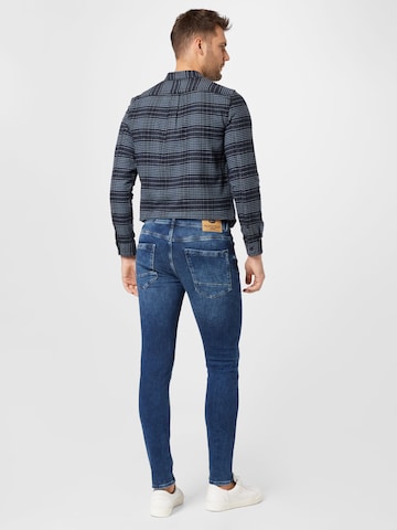 Coupe slim Jean 'Jackson' Petrol Industries en bleu