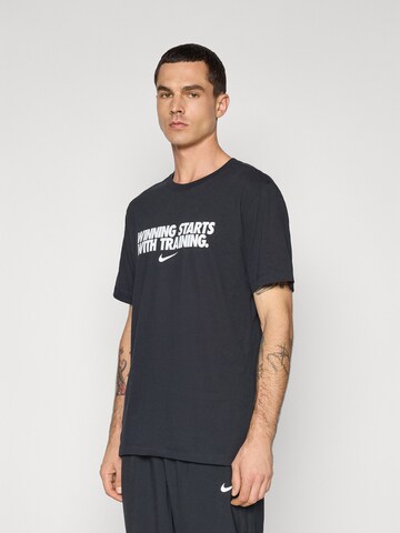 NIKE - Camiseta funcional 'WINNING' en negro: frente