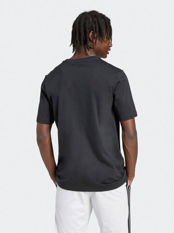 ADIDAS SPORTSWEAR Λειτουργικό μπλουζάκι 'PENNANT' σε μαύρο