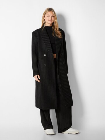 Bershka Between-Seasons Coat in Black: front