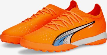 Chaussure de foot PUMA en orange
