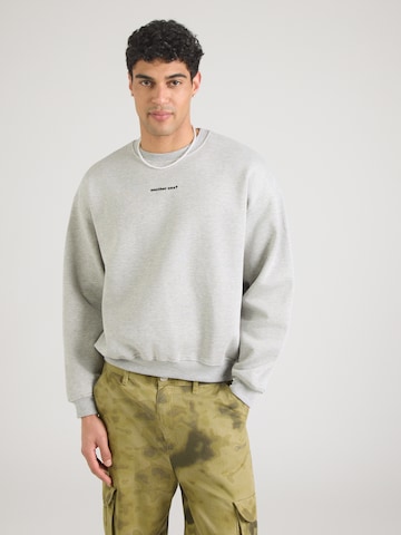 Kaotiko Bluzka sportowa 'ANOTHER ONE' w kolorze szary