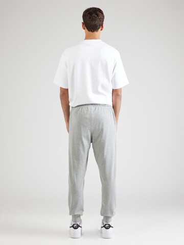 Nike Sportswear Alt kitsenev Püksid 'CLUB', värv hall
