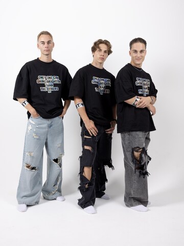 BTY Oversized tričko 'Unisex Oversized T-shirt' – černá
