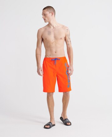 Superdry Skinny Board Shorts in Orange