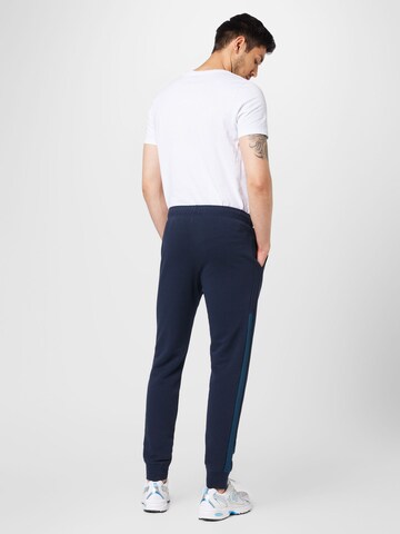 Champion Authentic Athletic Apparel Jogginganzug in Blau