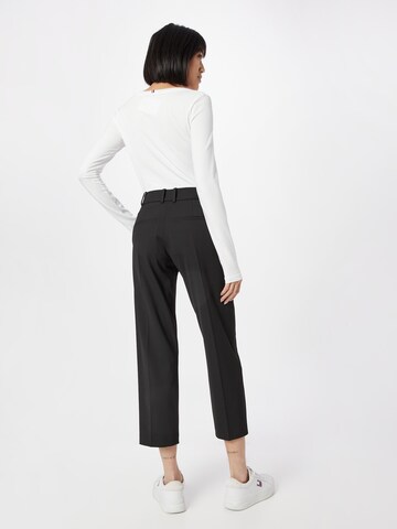 Regular Pantalon à plis TOMMY HILFIGER en noir