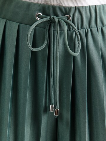ABOUT YOU Bő szár Nadrág 'Caren' - zöld