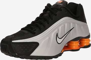 Baskets basses 'SHOX R4' Nike Sportswear en noir : devant
