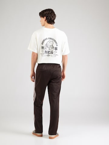 ADIDAS ORIGINALS Normalny krój Spodnie 'FIREBIRD' w kolorze brązowy