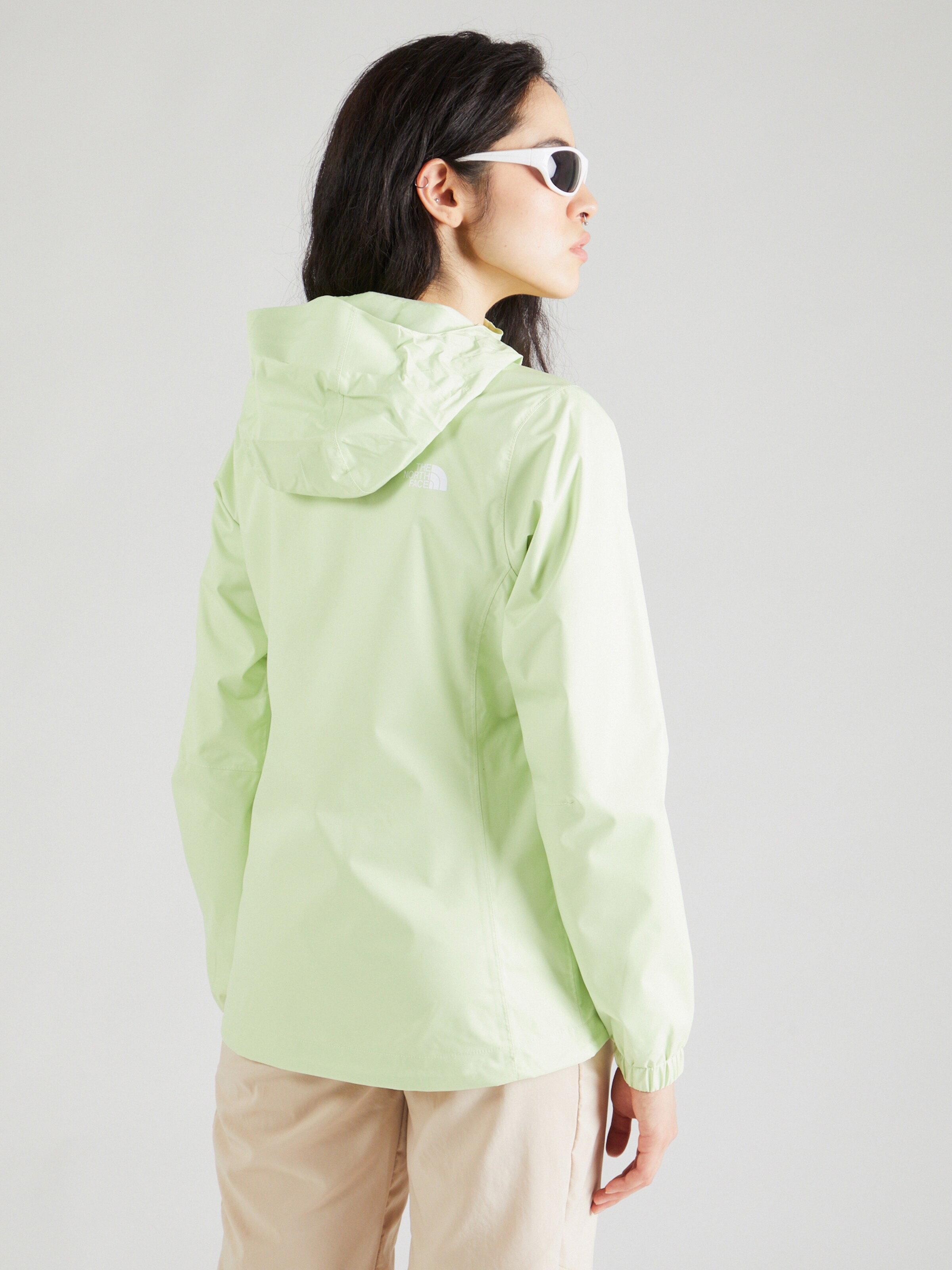 Green north face rain jacket sales