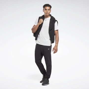 Reebok Tapered Workout Pants in Black