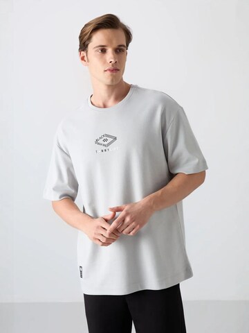 T-Shirt 'T-Shirts' Tommy Life en gris