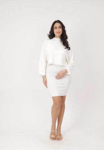 Elara Kjole i hvid: forside