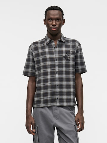 Coupe regular Chemise HOLLISTER en noir : devant