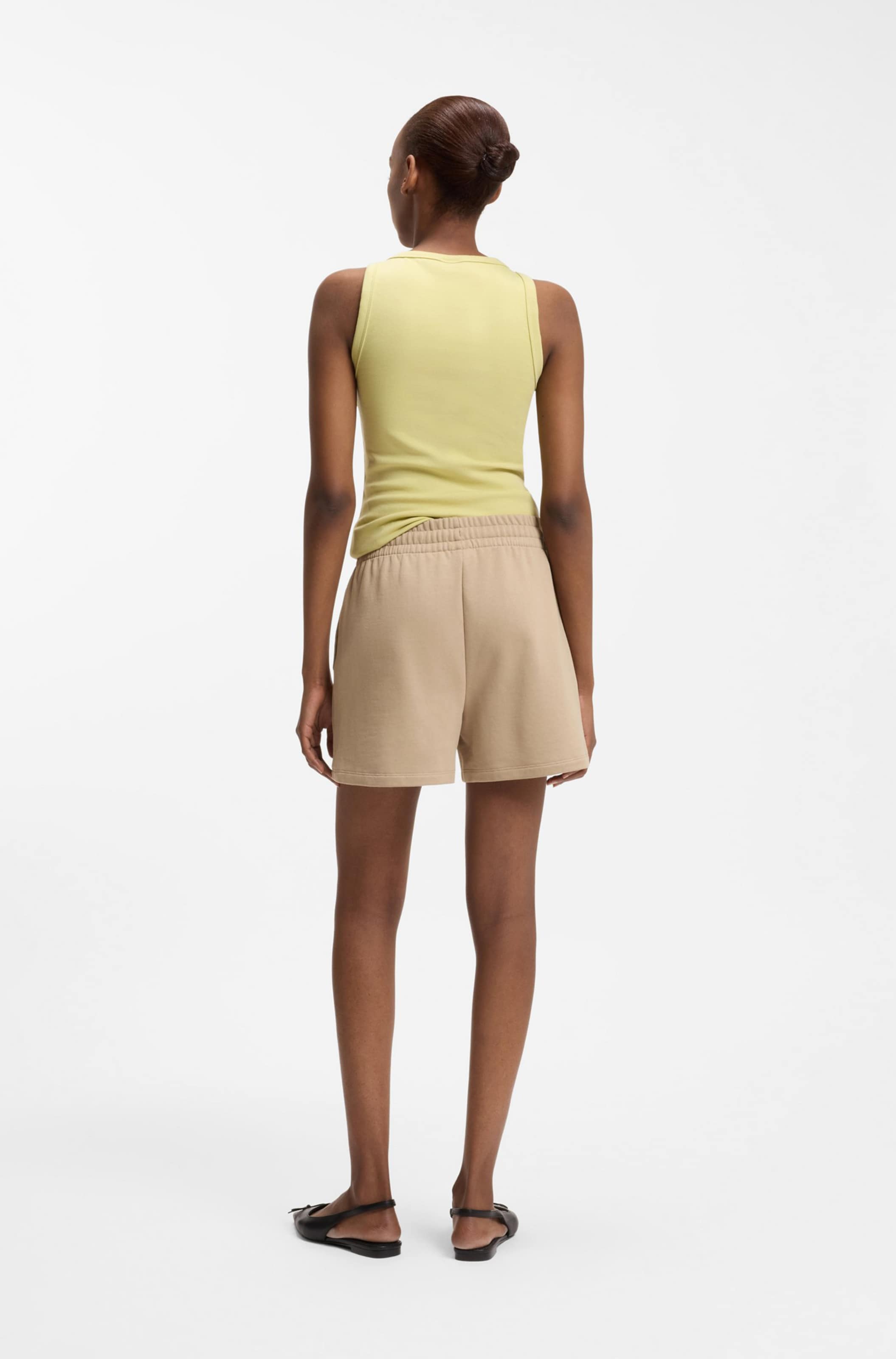 HUGO Loose fit Pants 'Ninosta' in Brown