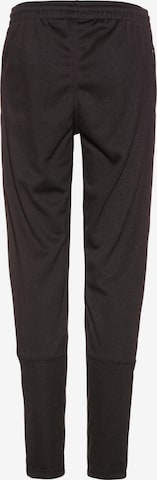 Tapered Pantaloni sportivi di JAKO in nero