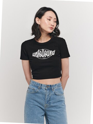 UNFOLLOWED x ABOUT YOU Shirt 'GIRLFRIEND' in Black: front