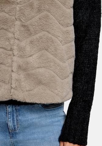 Gilet di Cartoon in grigio