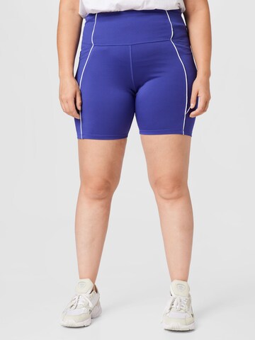 Skinny Pantalon de sport Reebok en violet : devant