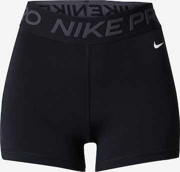 Skinny Pantalon de sport NIKE en noir : devant