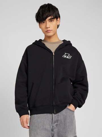 Low Lights Studios Zip-Up Hoodie in Black: front